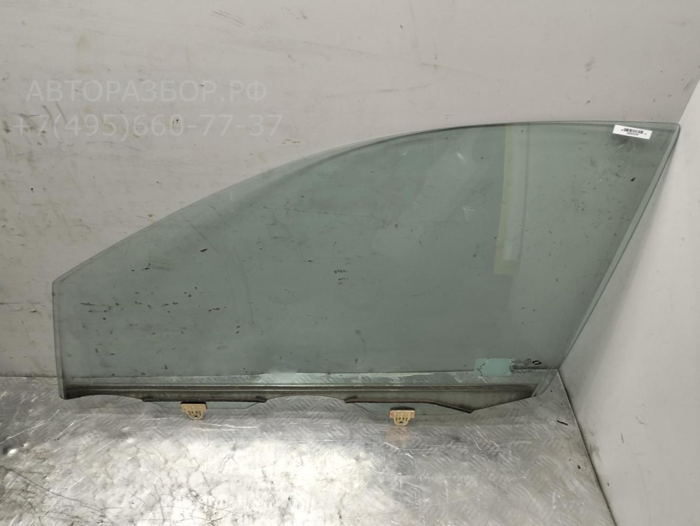 Стекло двери передней левой