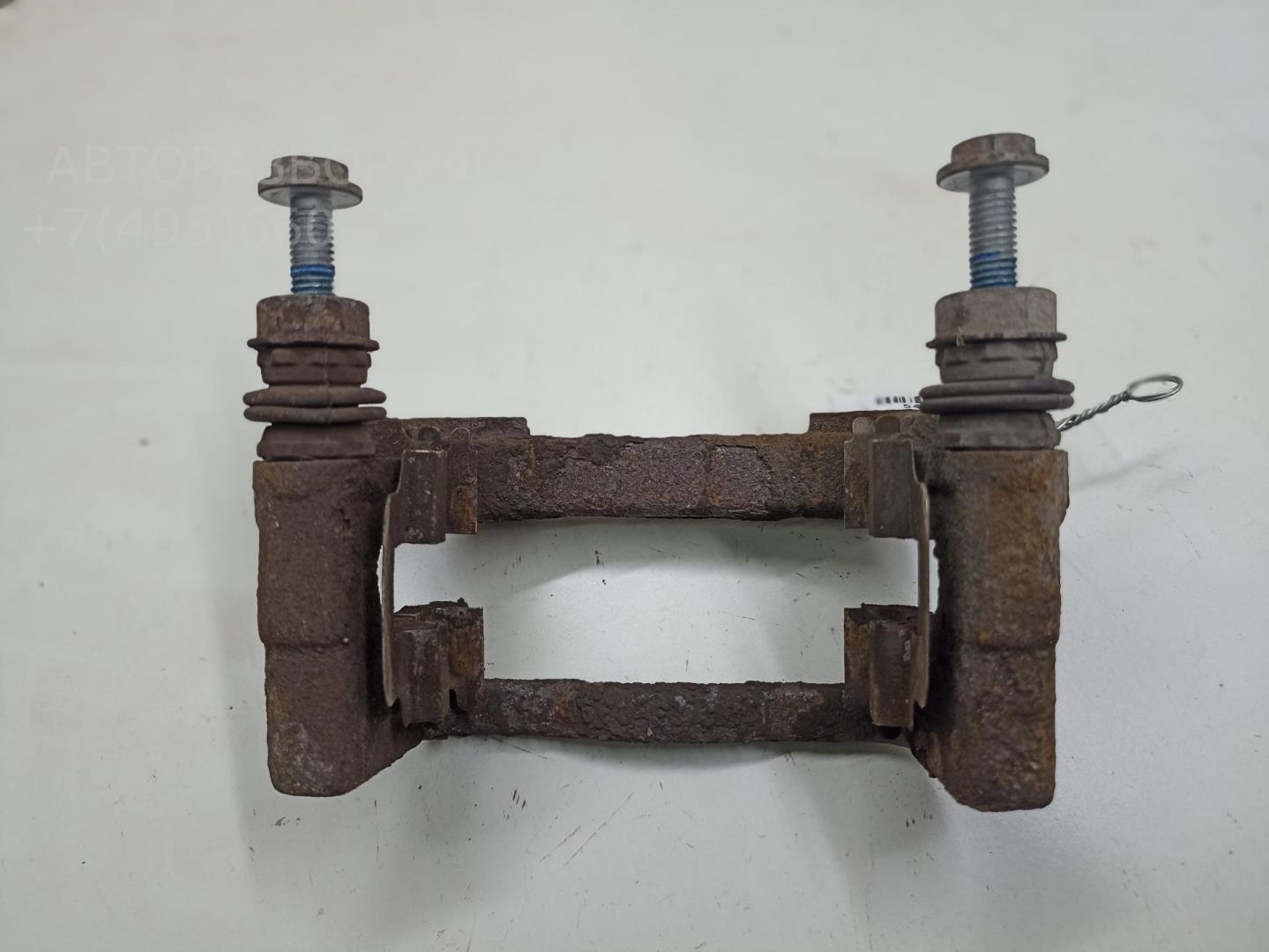 Скоба суппорта заднего