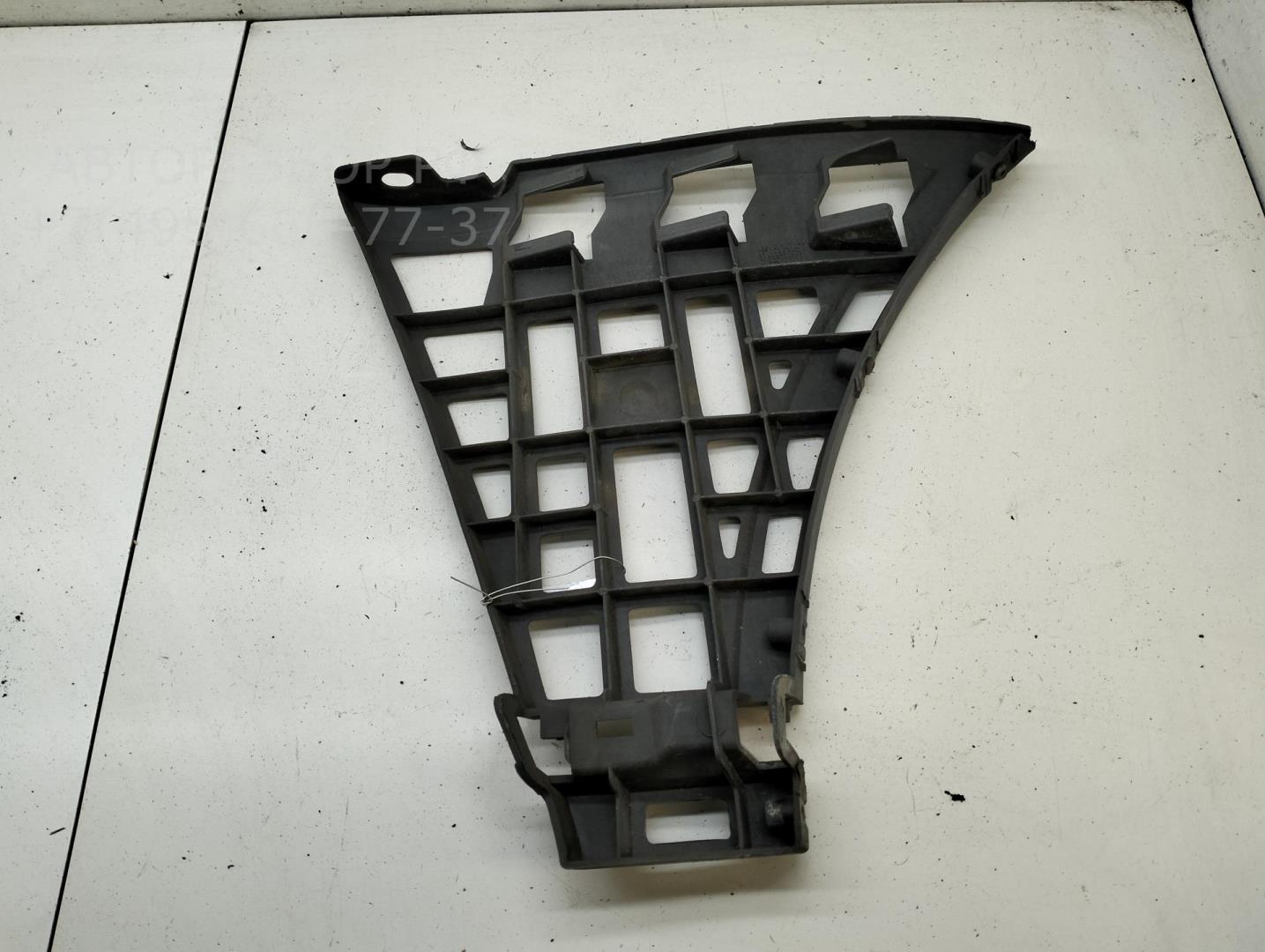 Кронштейн заднего бампера левый