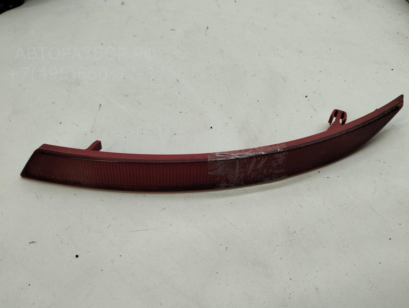 Отражатель в бампер задний левый