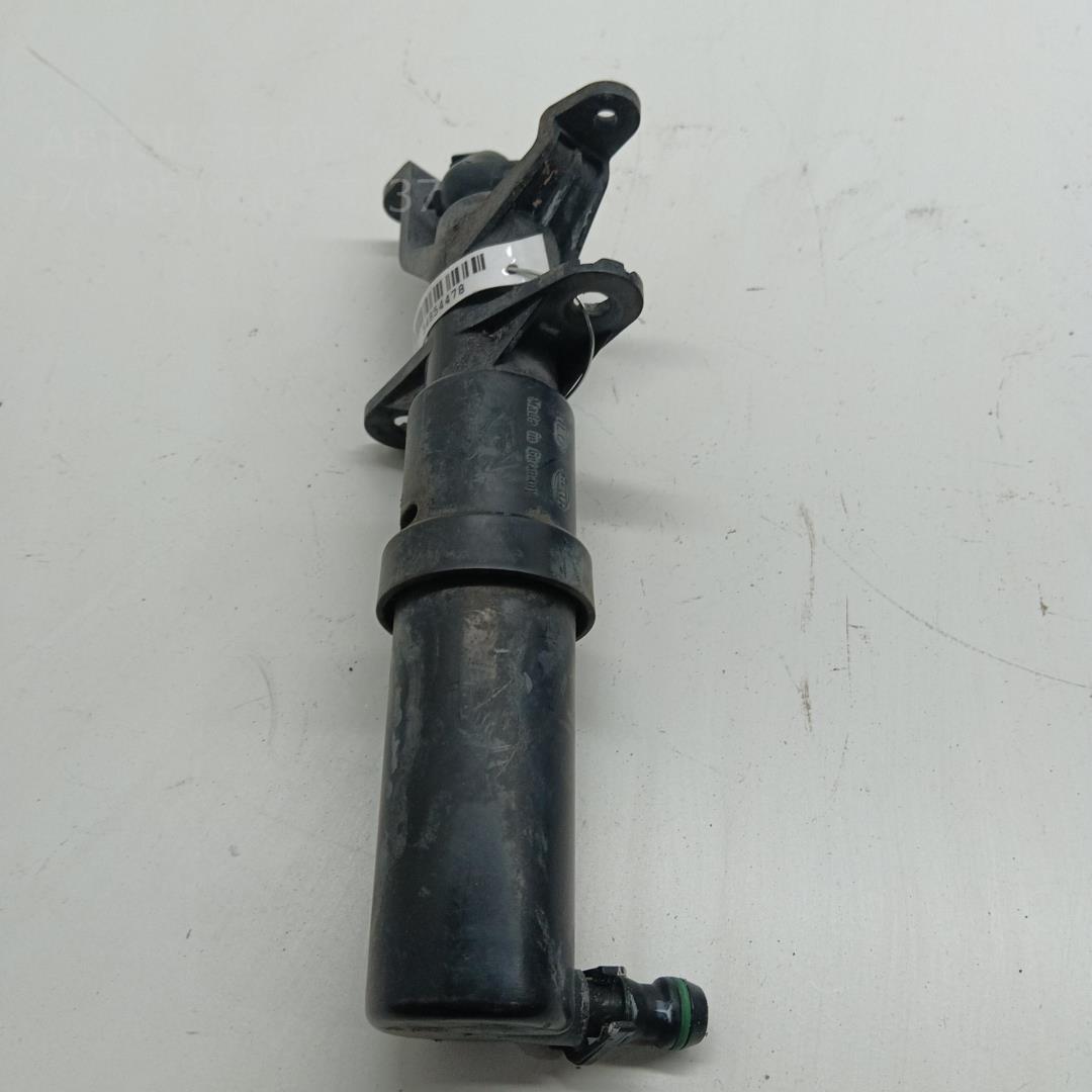 Форсунка омывателя фары