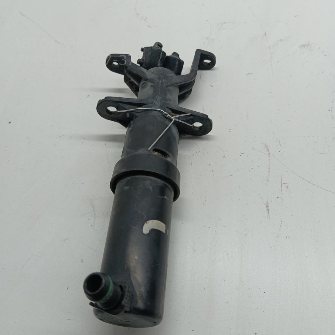 Форсунка омывателя фары