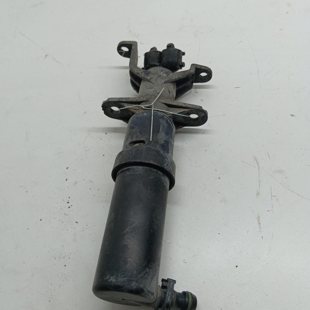 Форсунка омывателя фары