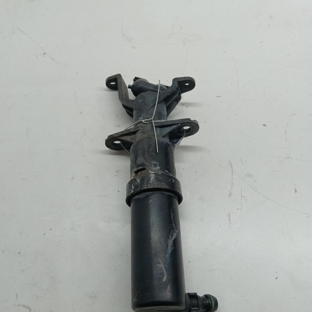 Форсунка омывателя фары