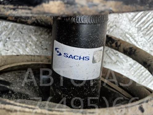 Амортизатор передний левый