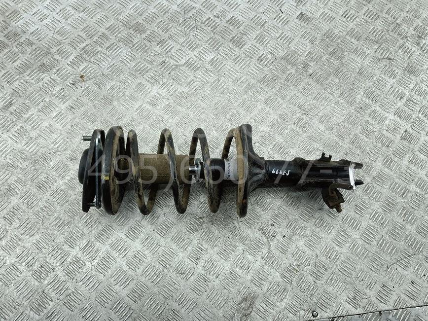 Амортизатор передний левый