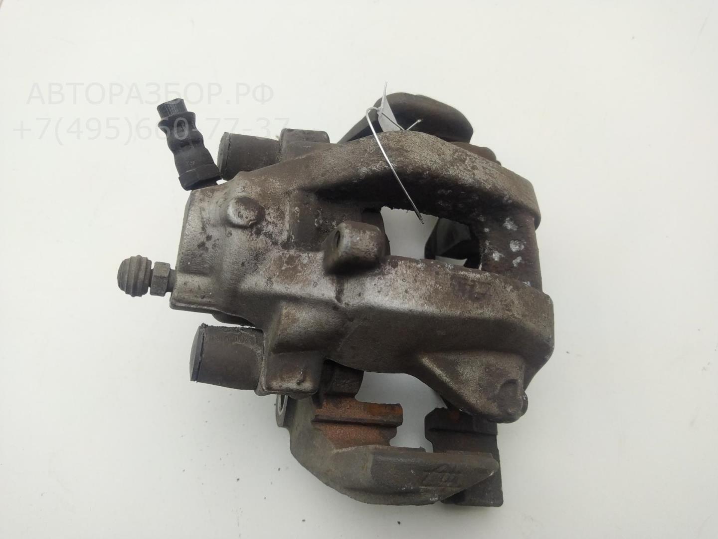 Суппорт задний левый