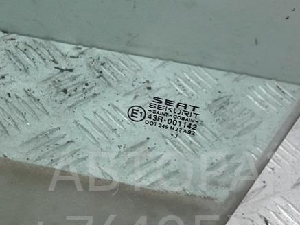 Стекло двери передней левой