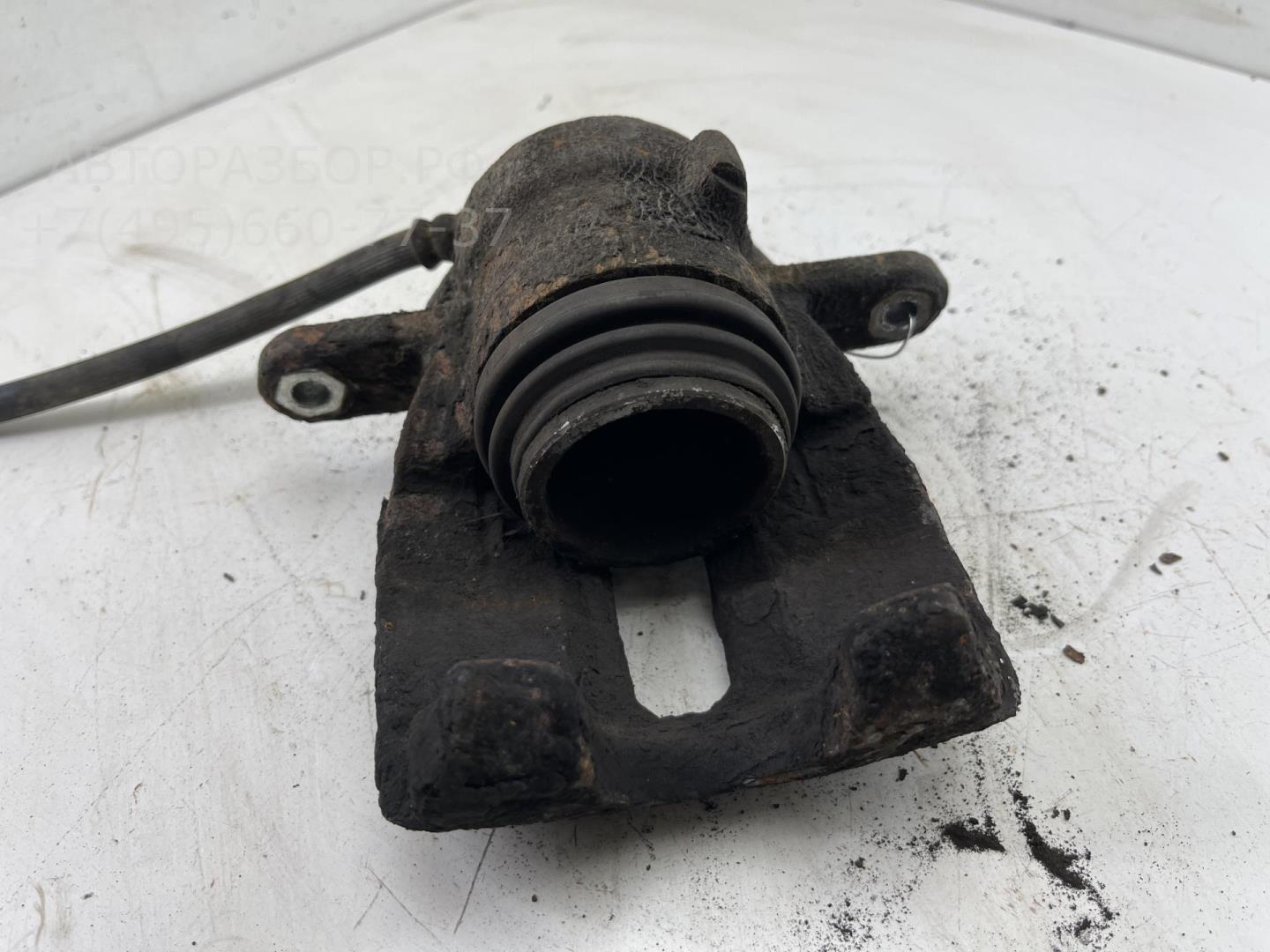 Суппорт передний левый