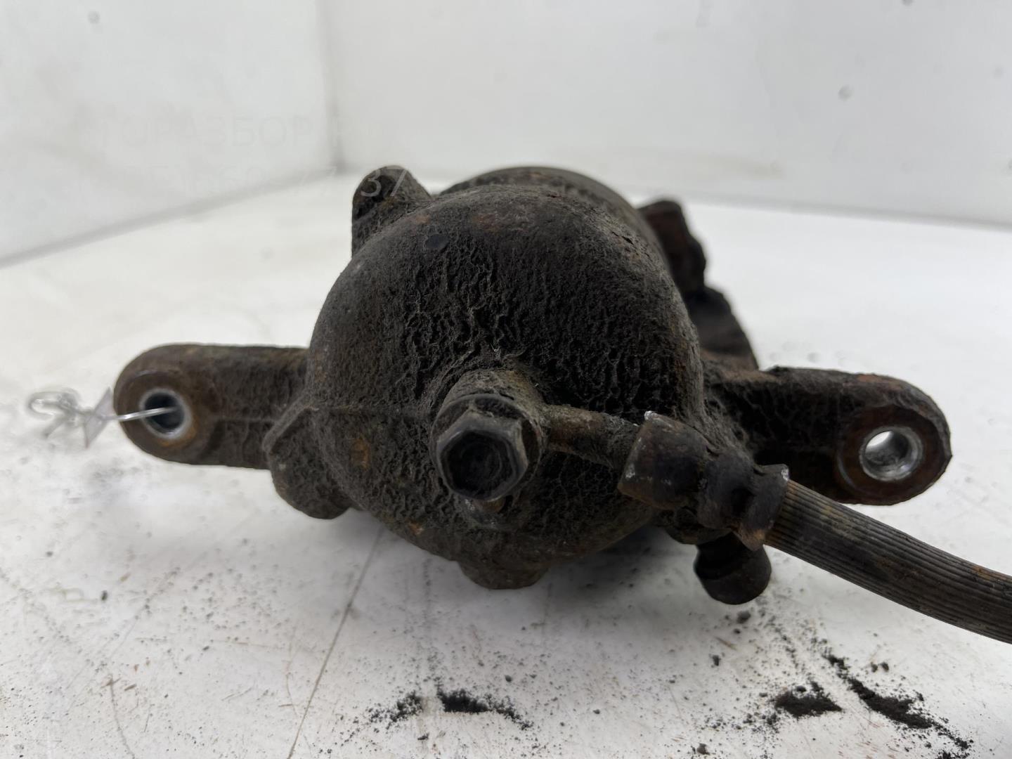 Суппорт передний левый