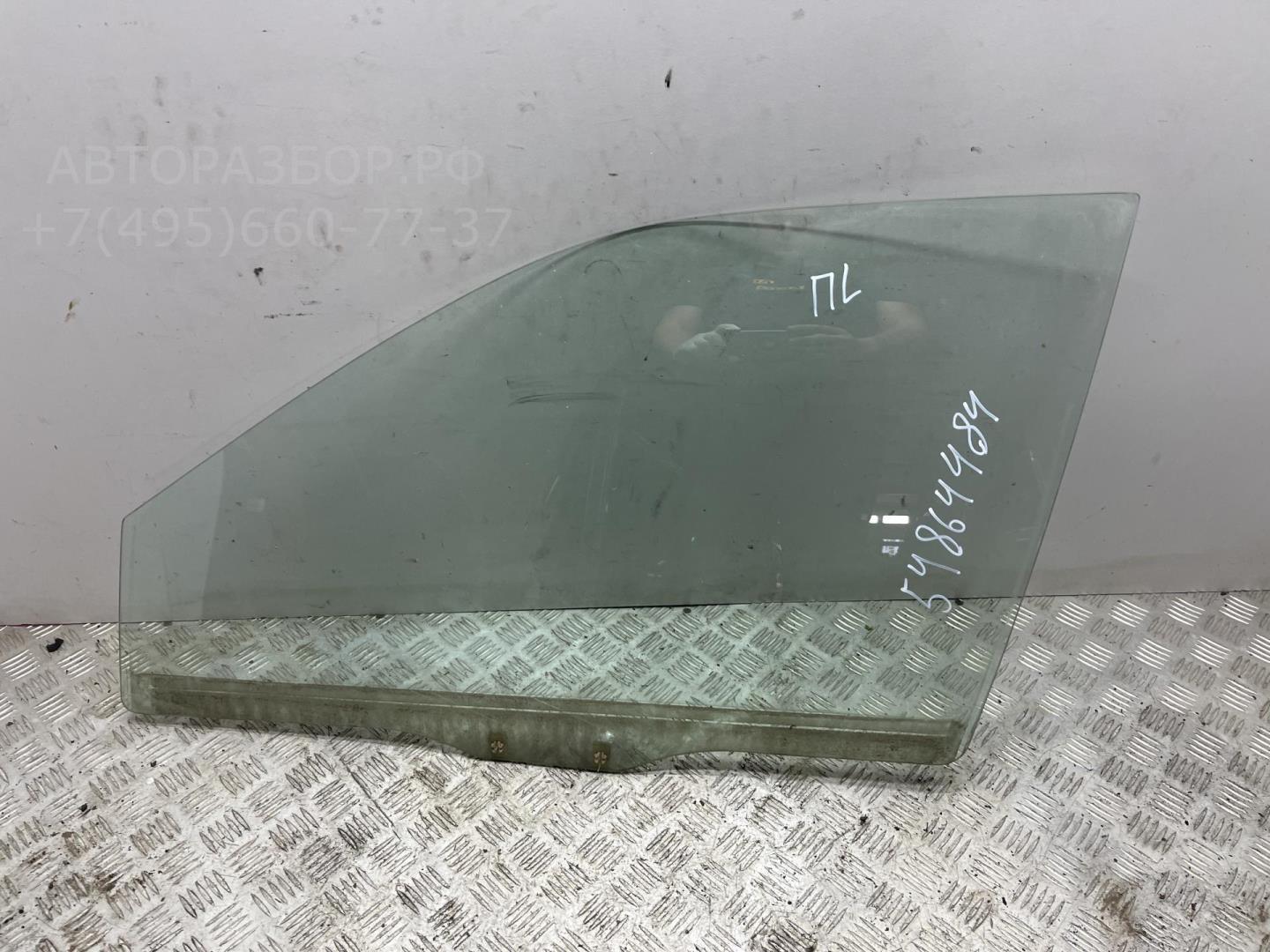 Стекло двери передней левой