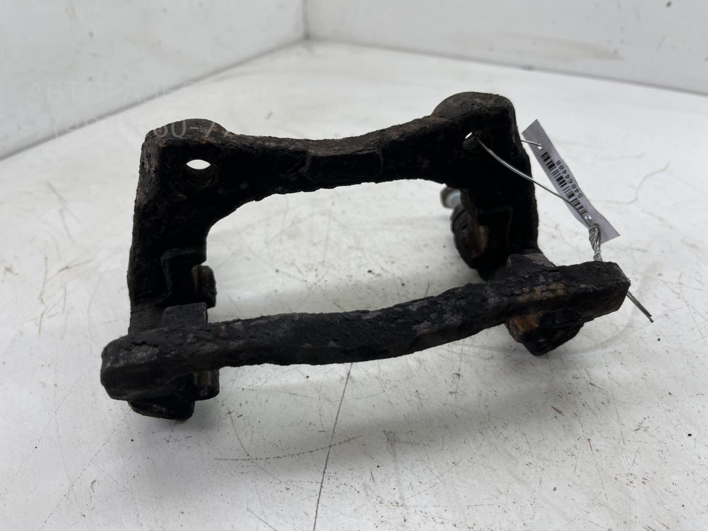 Скоба суппорта переднего