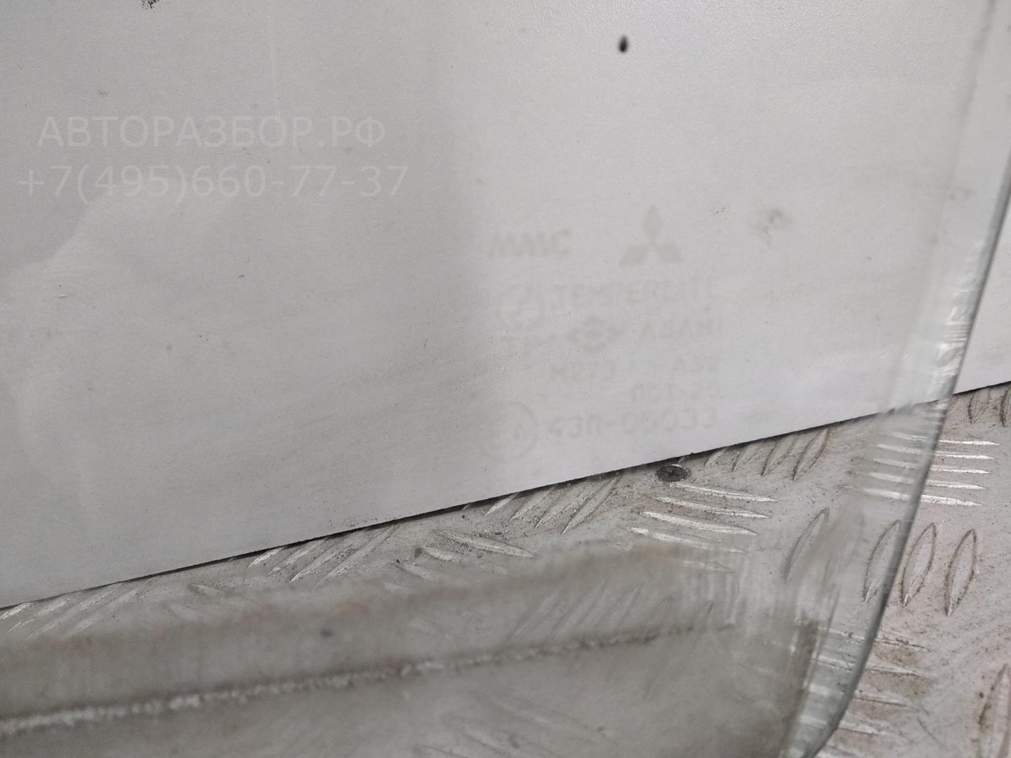 Стекло двери передней левой