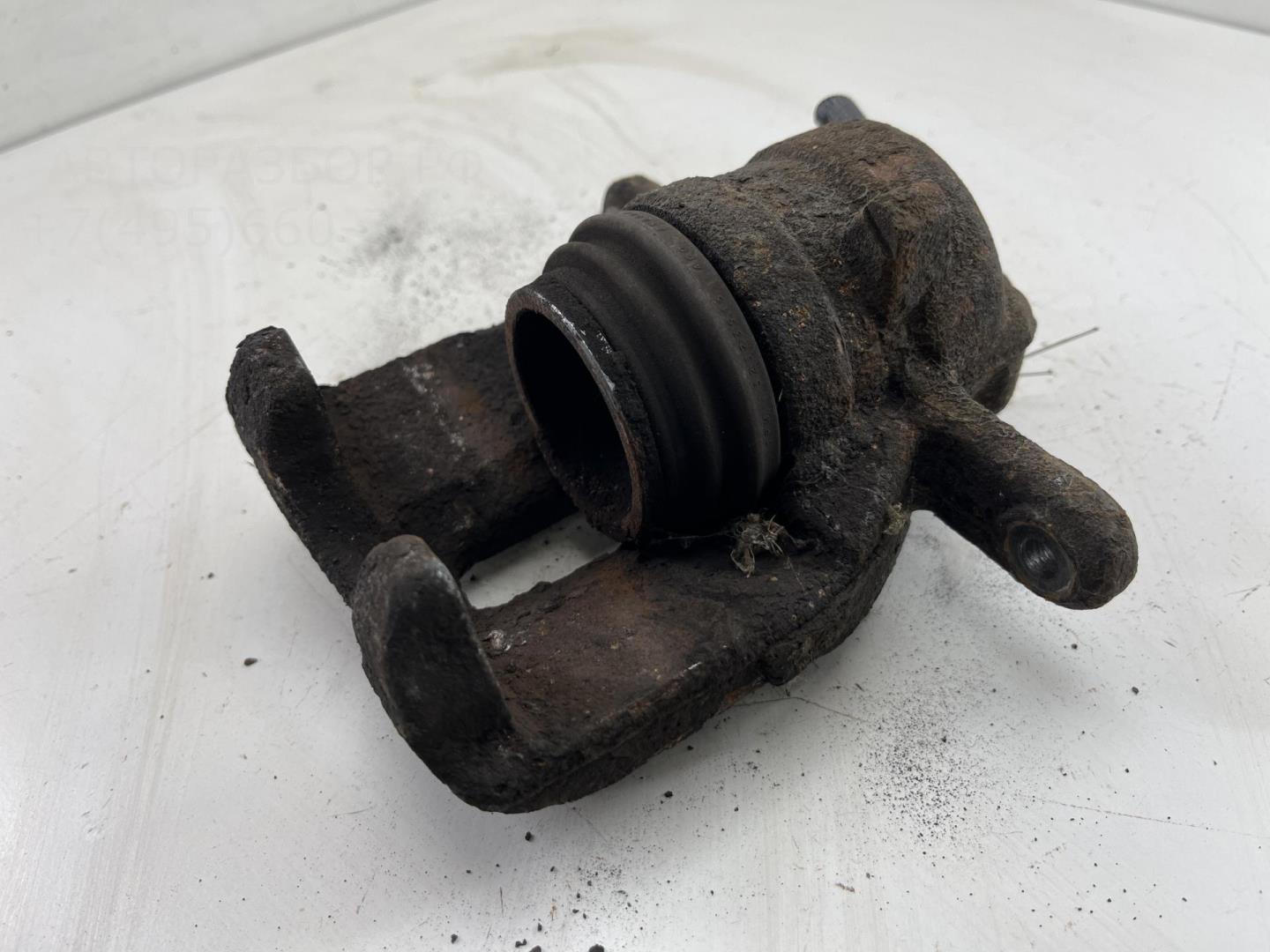 Суппорт передний левый