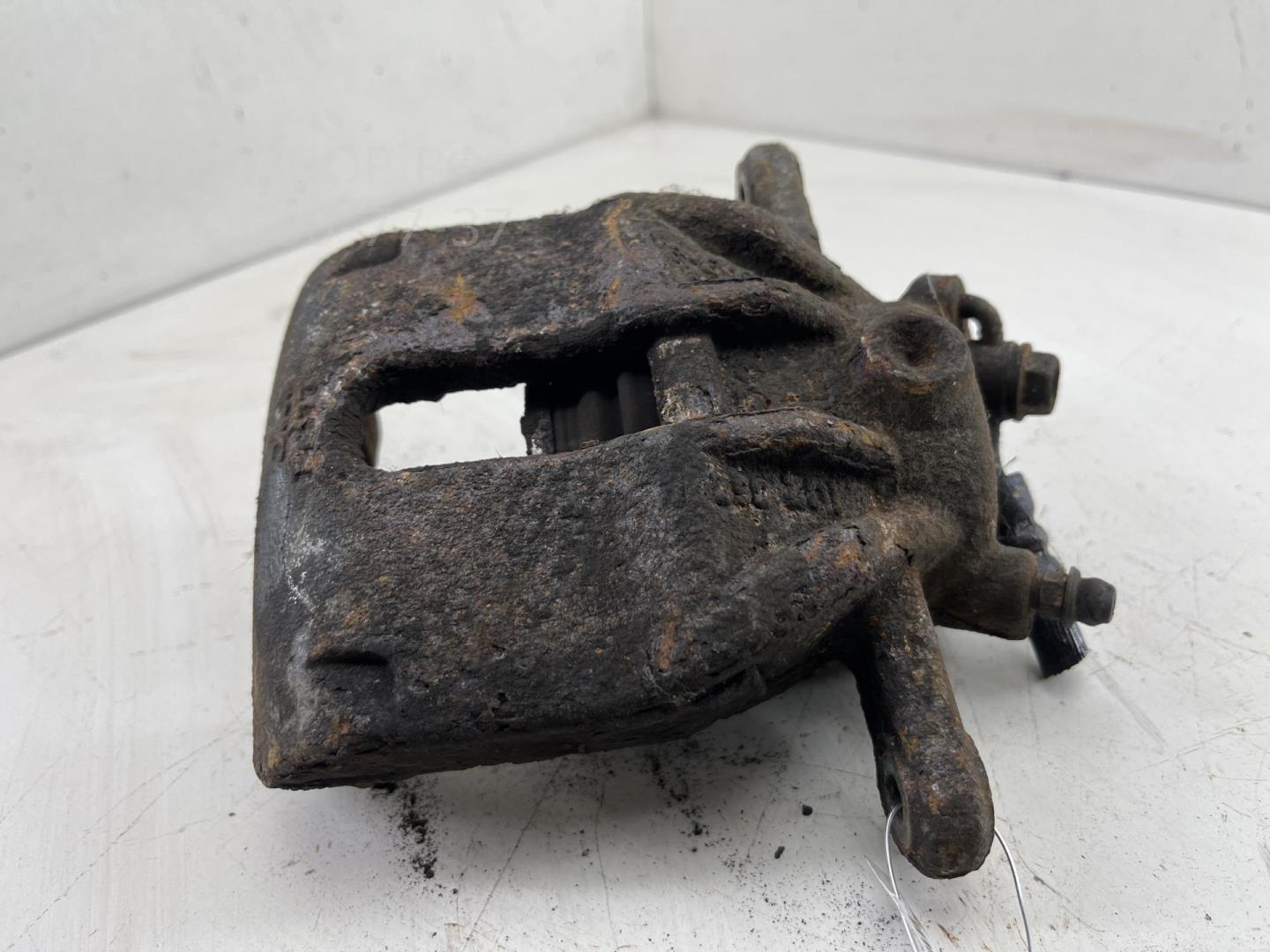 Суппорт передний левый