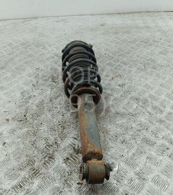 Амортизатор передний левый