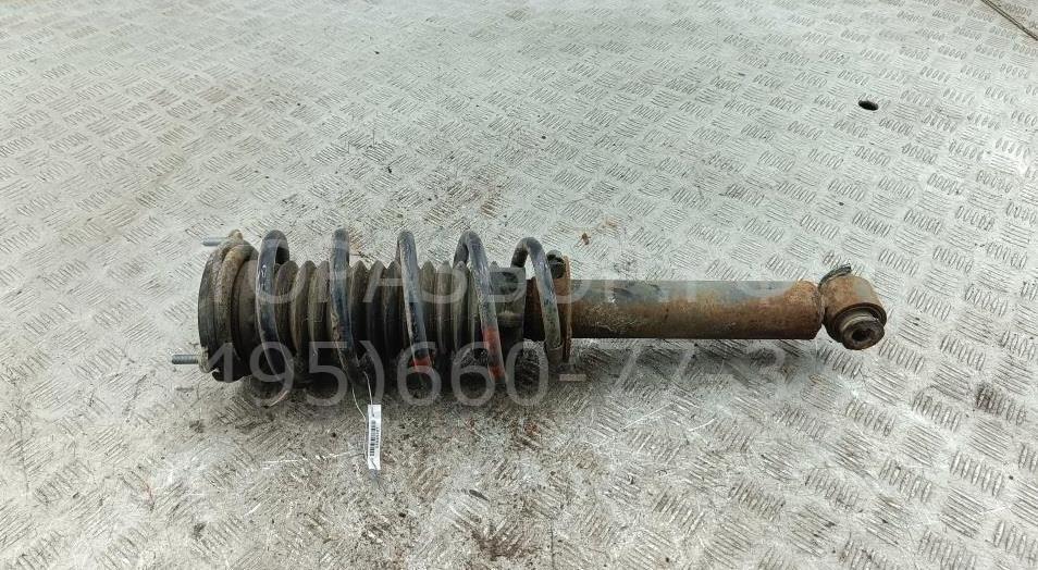 Амортизатор передний левый