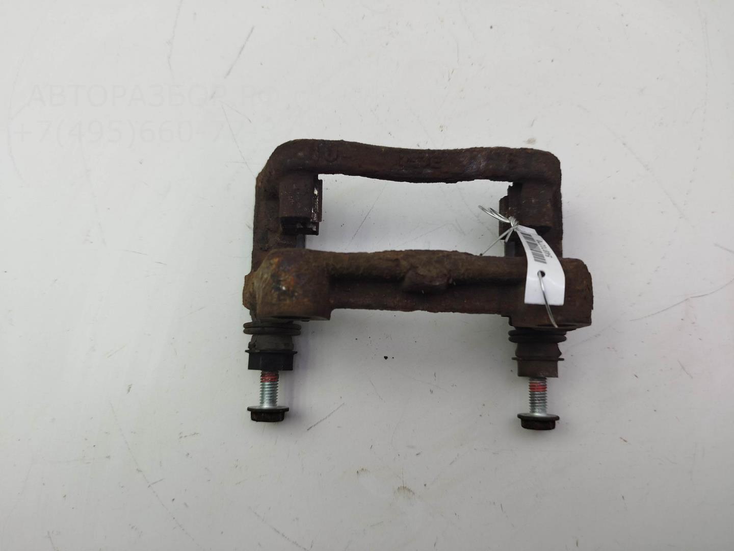 Скоба суппорта заднего