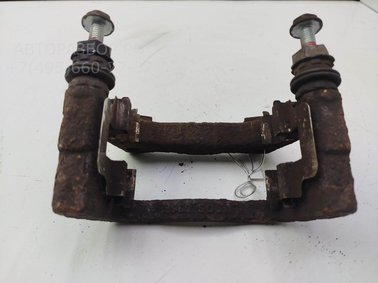 Скоба суппорта заднего