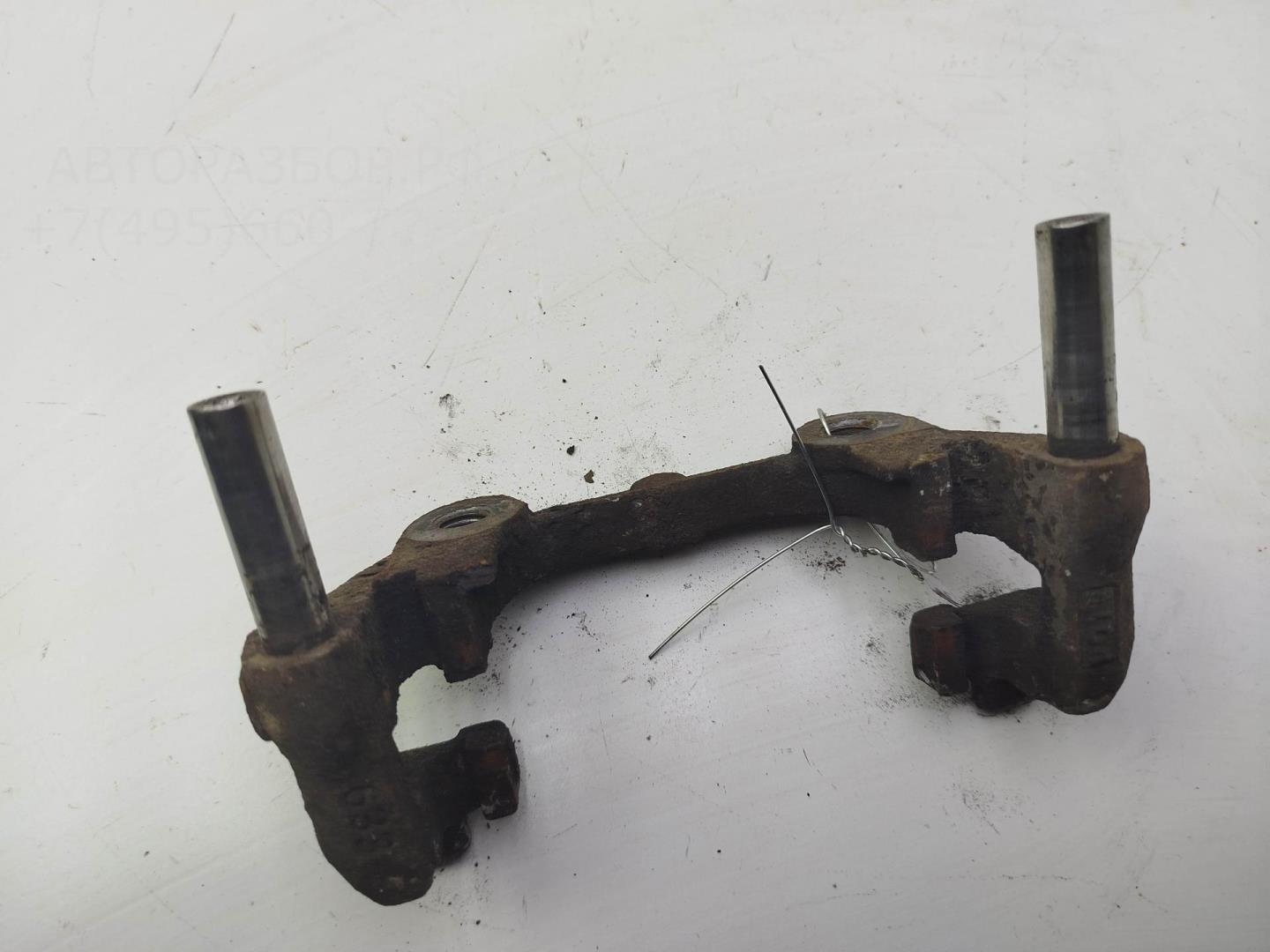 Скоба суппорта заднего