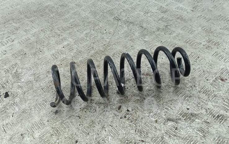Пружина задняя