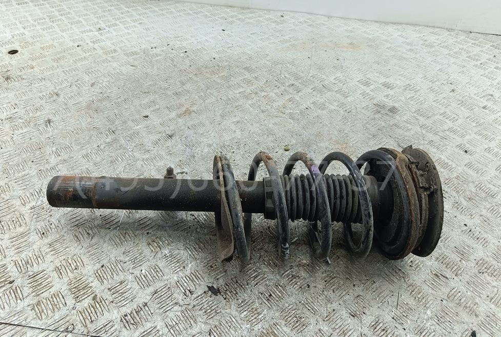 Амортизатор передний левый