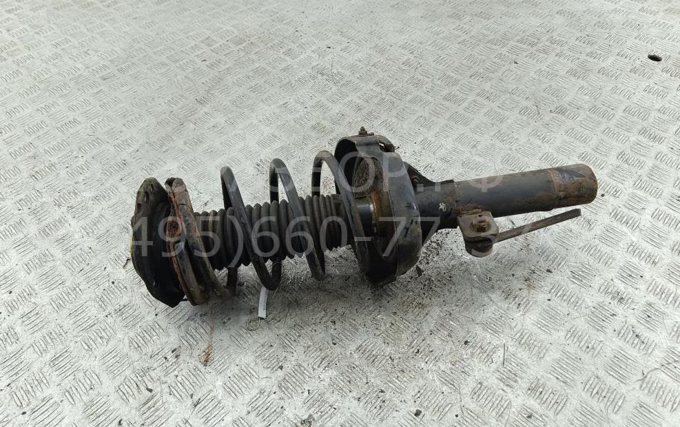 Амортизатор передний левый