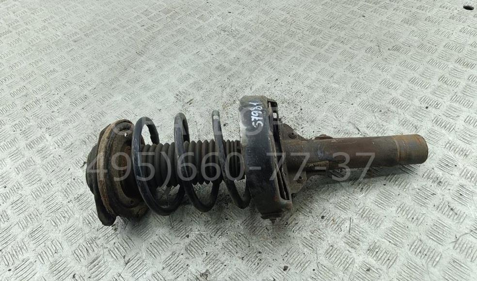 Амортизатор передний левый