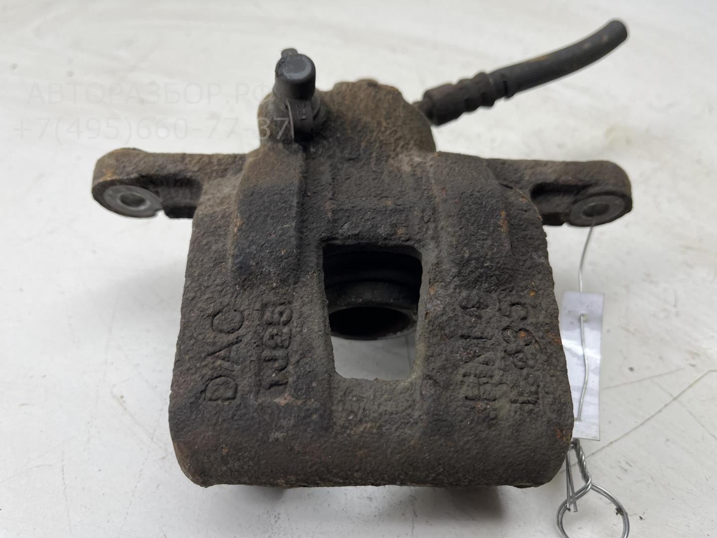 Суппорт задний левый