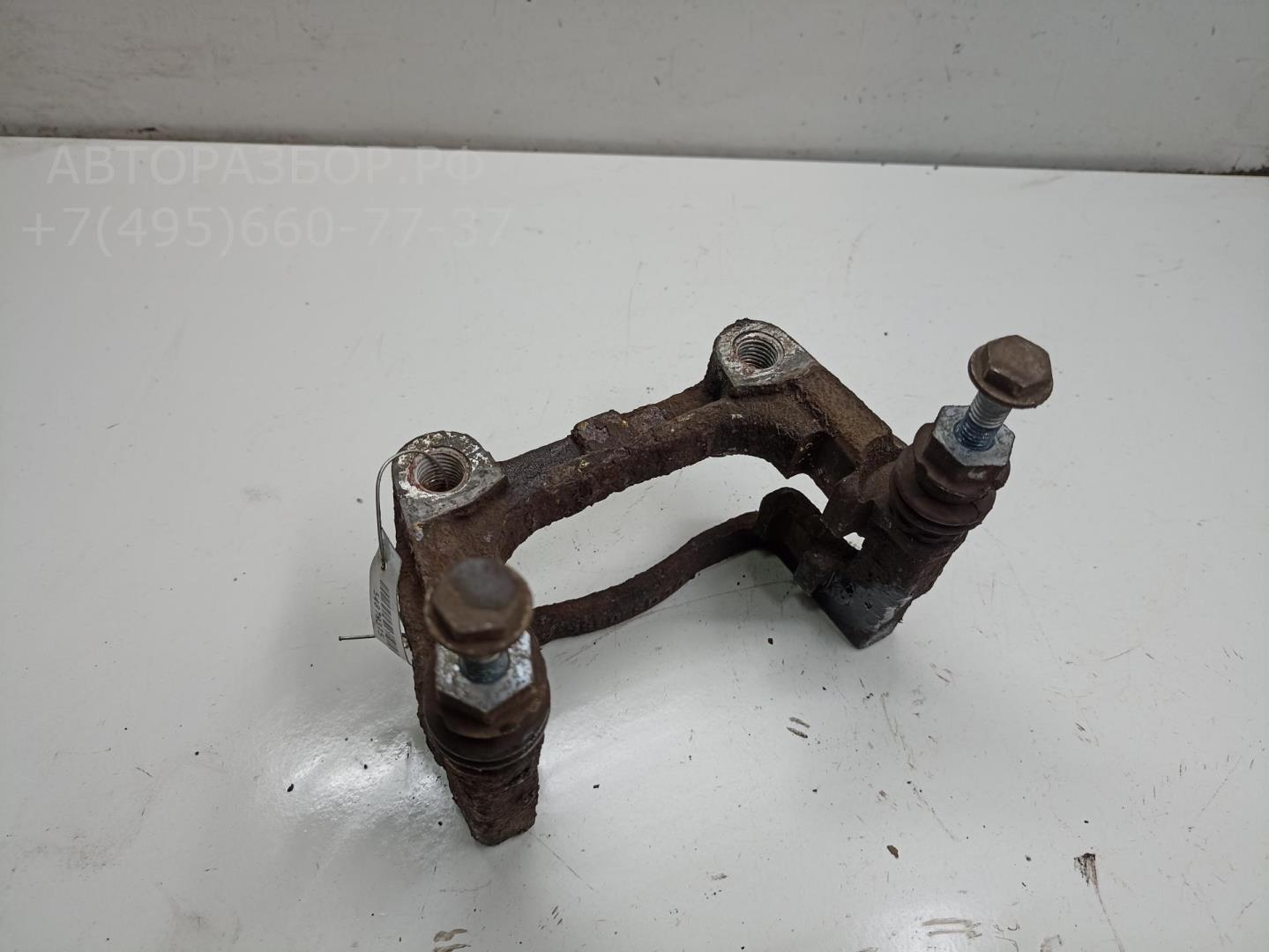 Скоба суппорта заднего