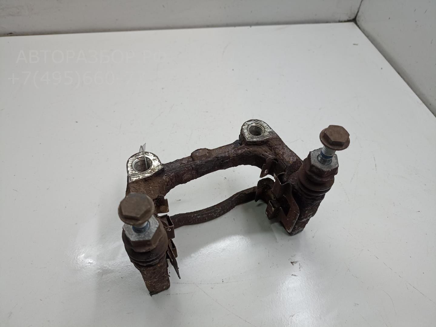 Скоба суппорта заднего