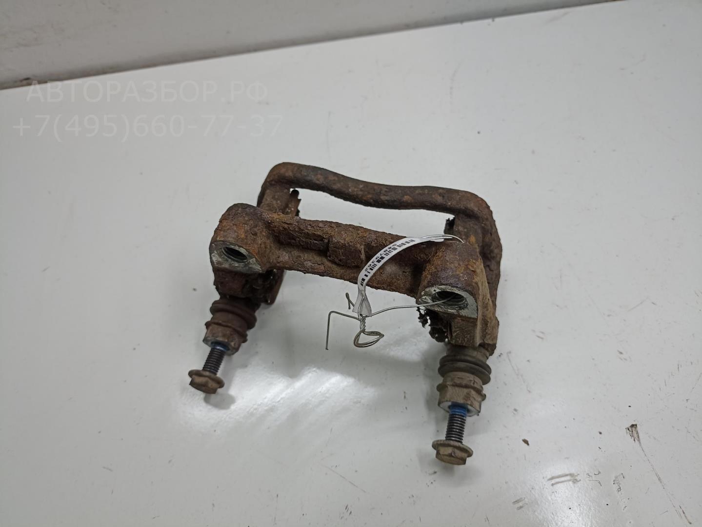 Скоба суппорта заднего