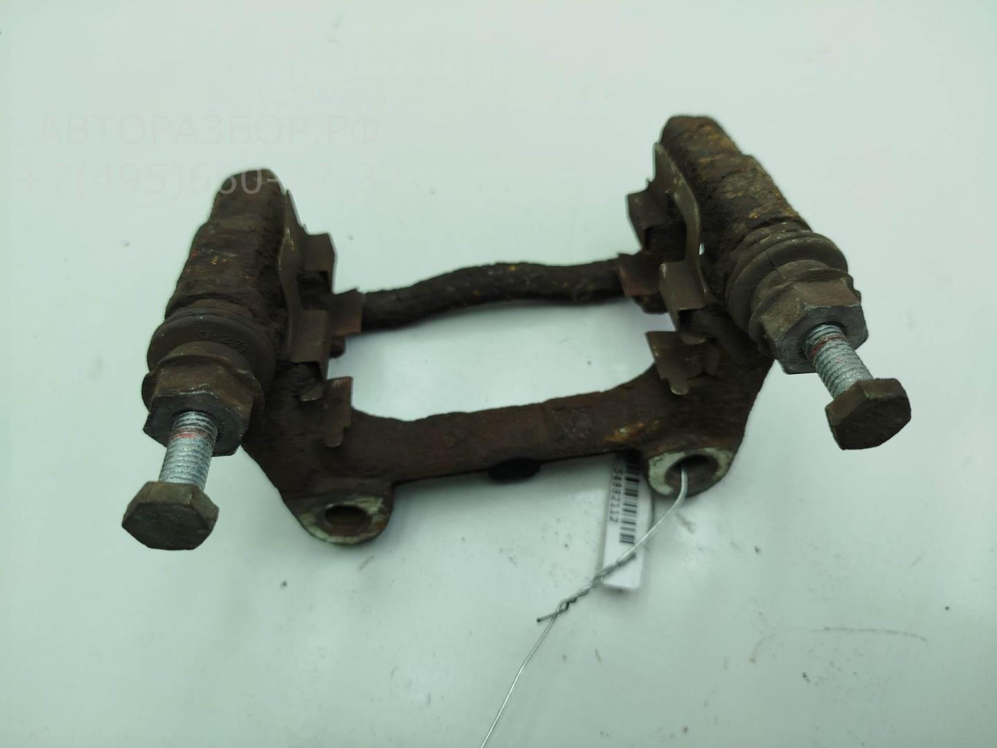 Скоба суппорта заднего