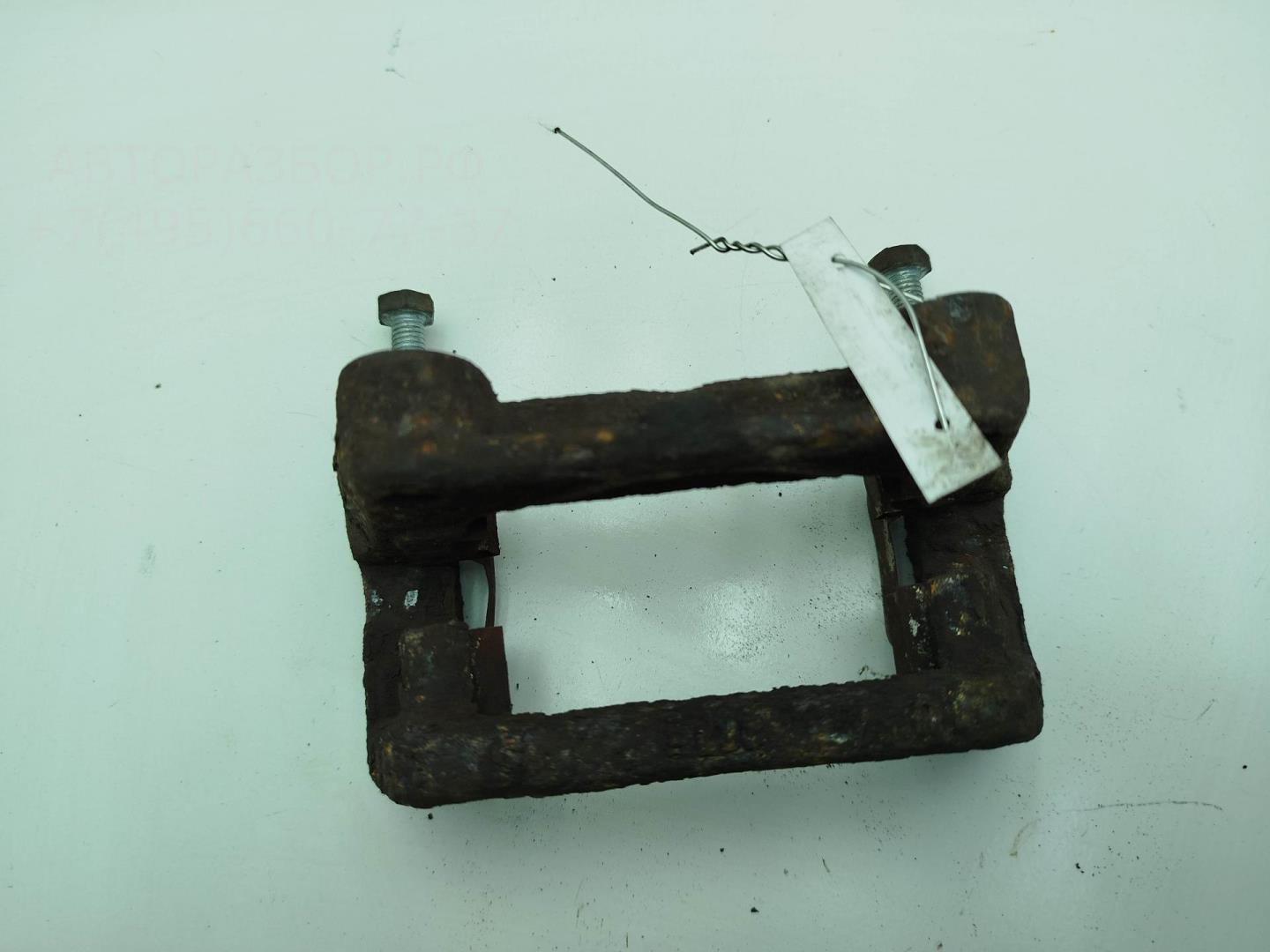 Скоба суппорта заднего