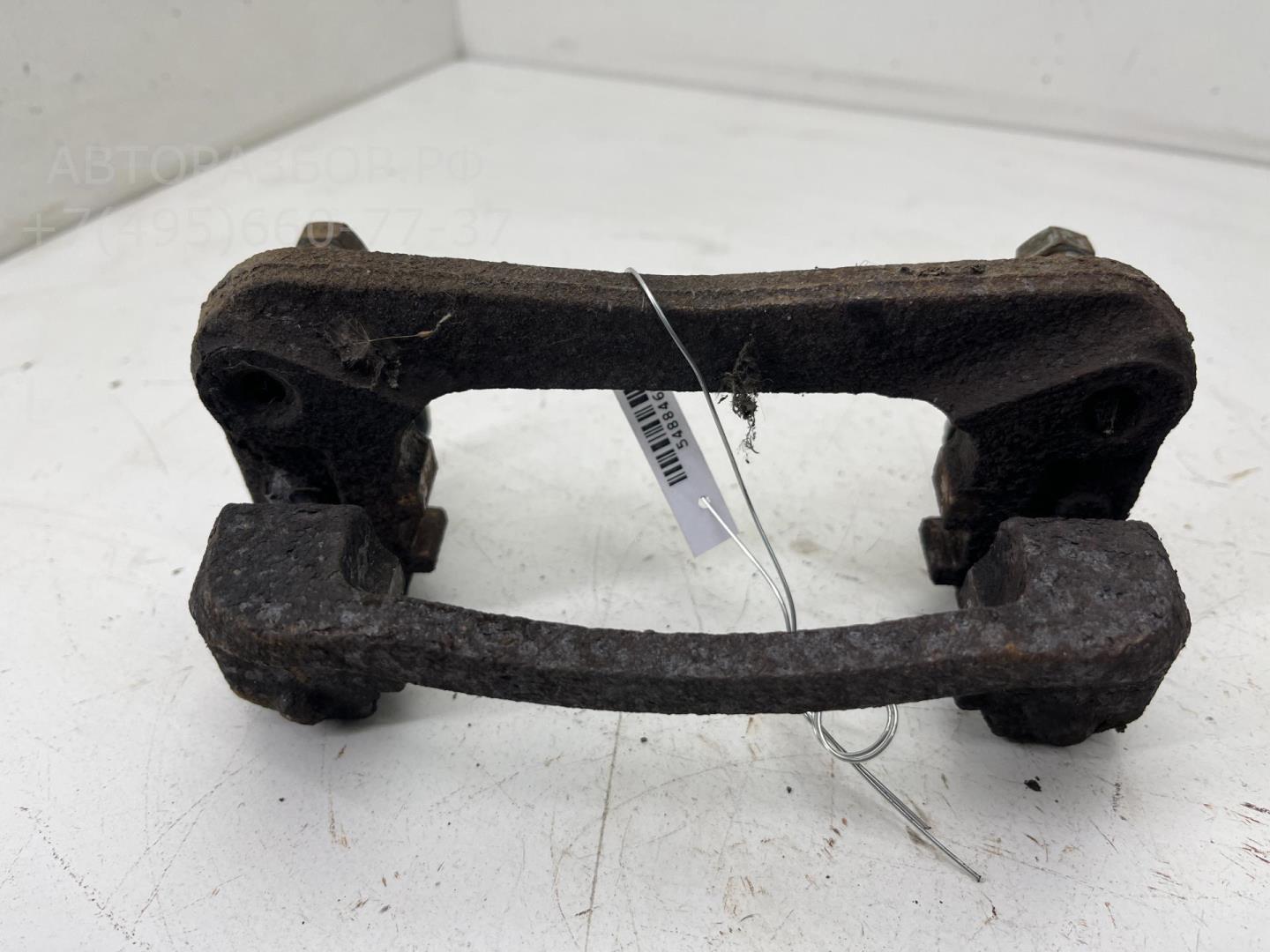 Скоба суппорта заднего