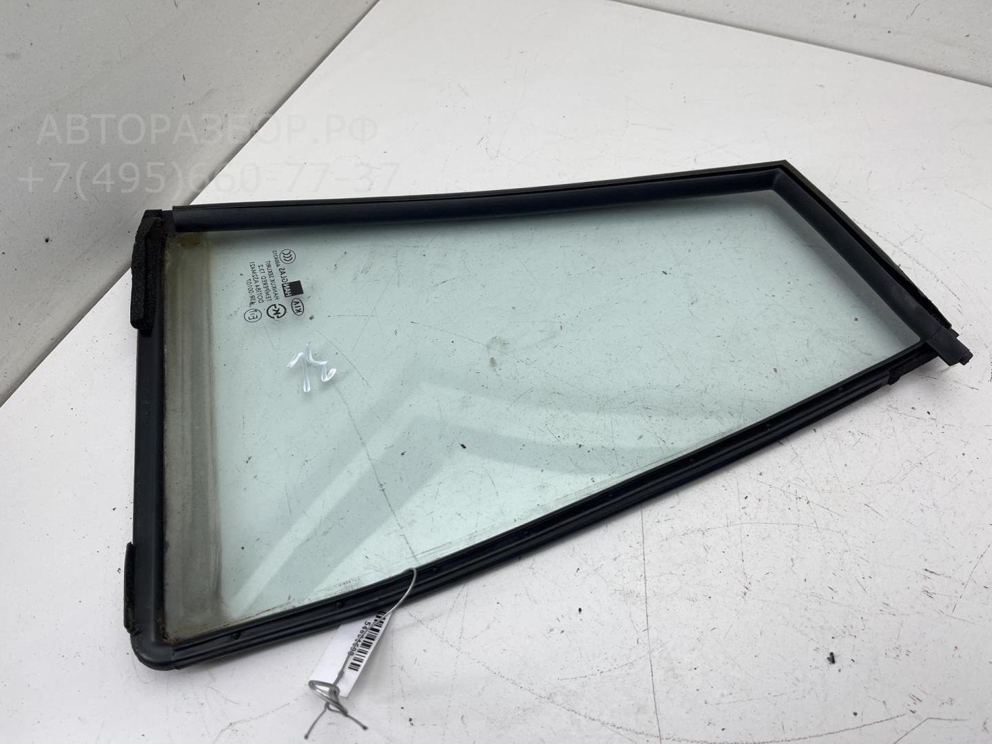 Стекло двери задней левой (форточка)