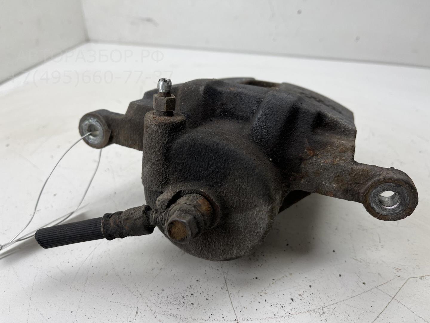 Суппорт передний левый