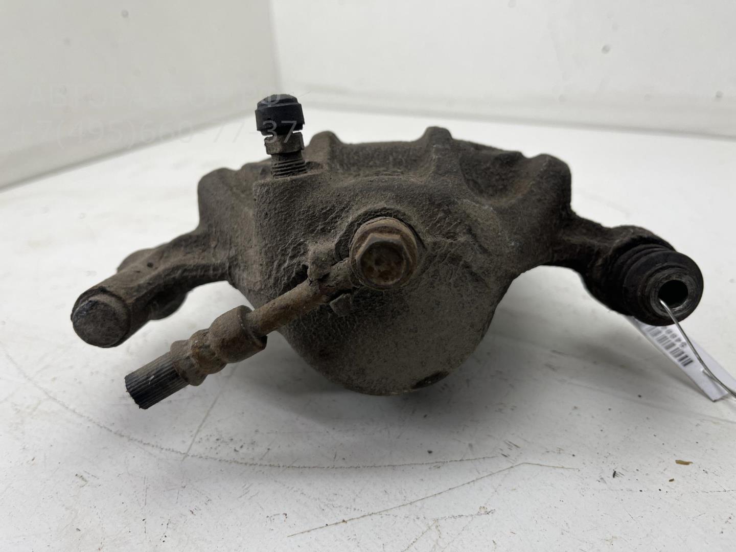 Суппорт передний левый