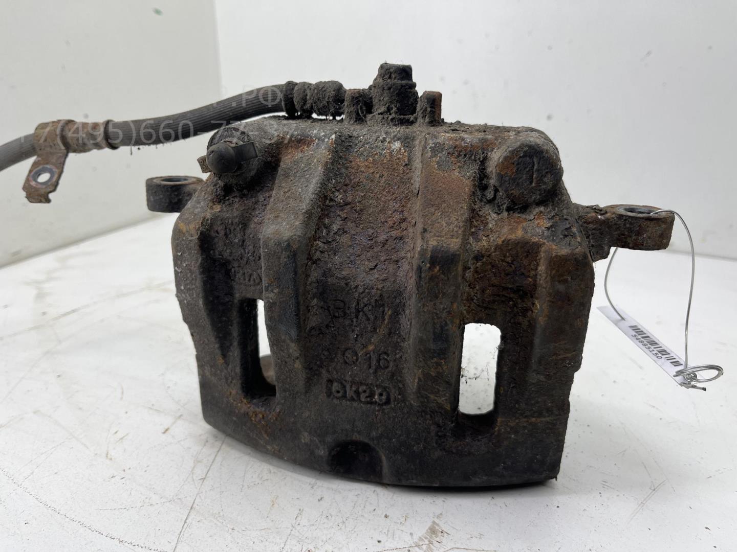 Суппорт передний левый