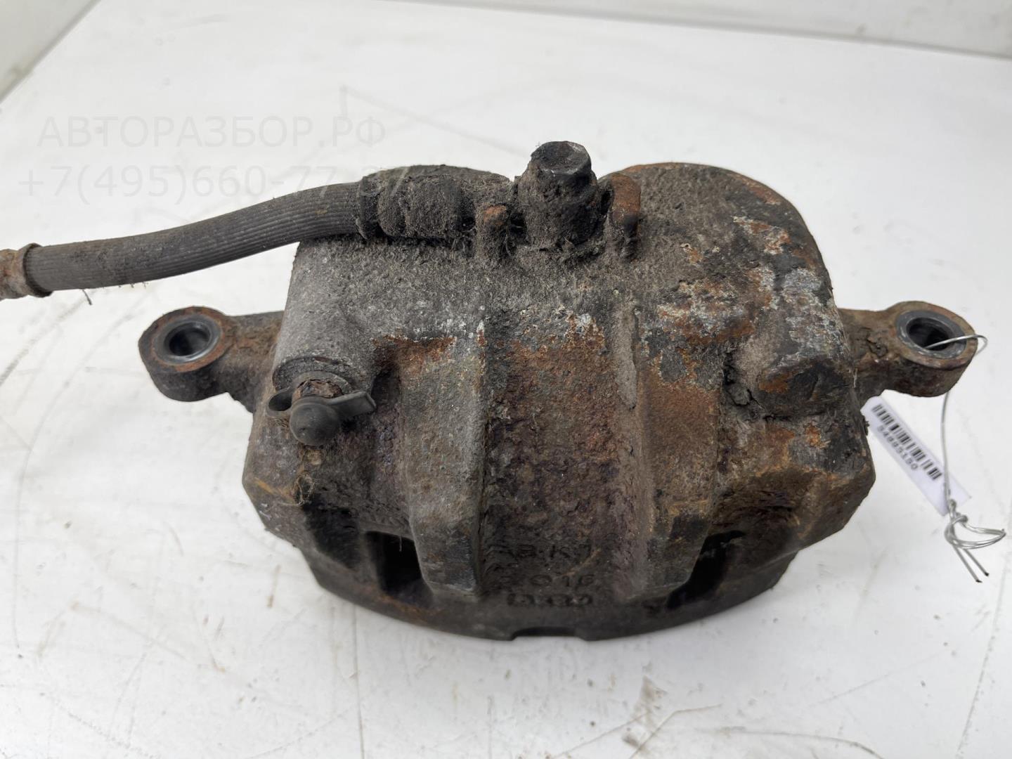 Суппорт передний левый