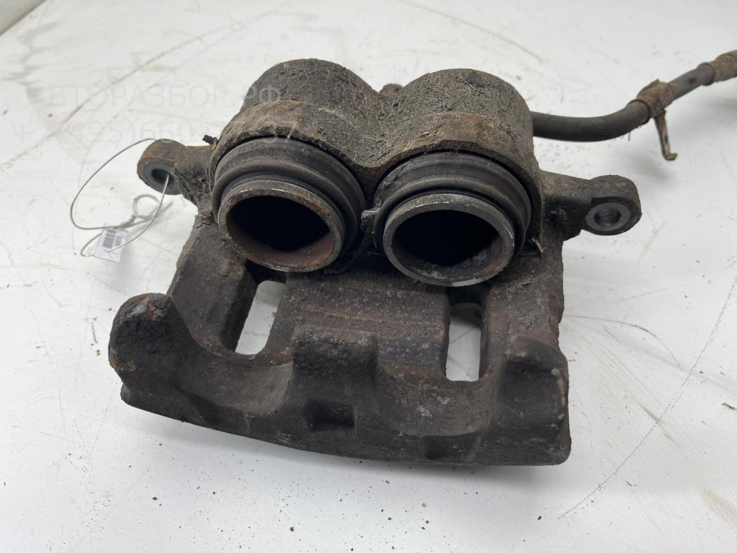 Суппорт передний левый