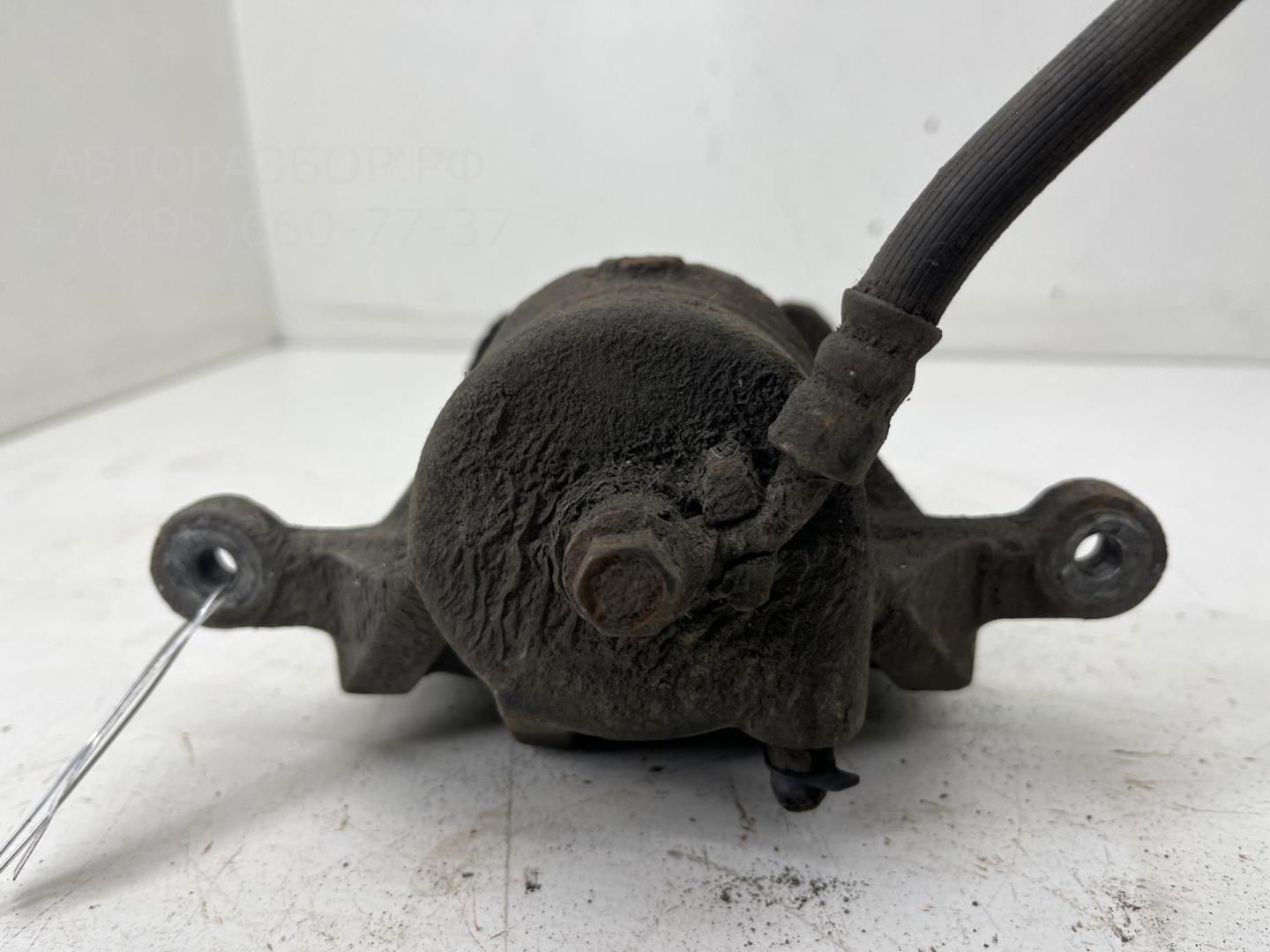 Суппорт передний левый