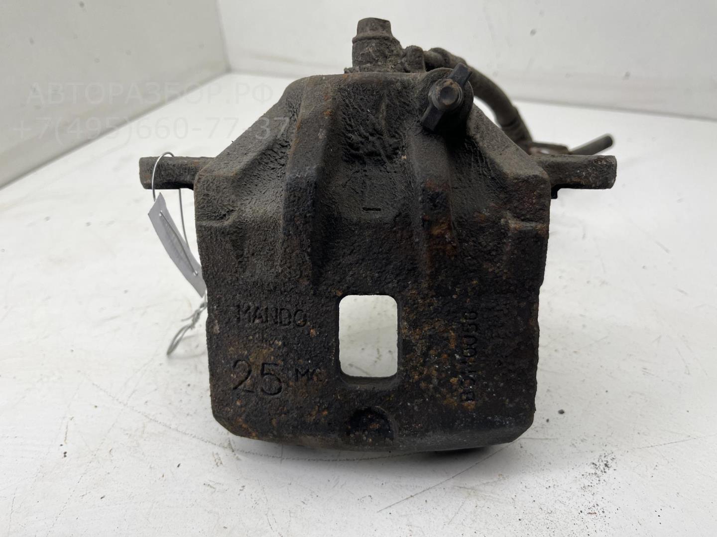 Суппорт передний левый