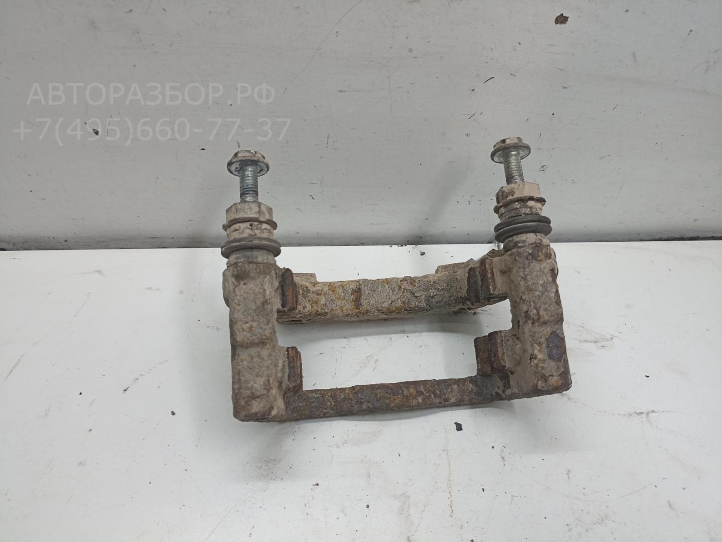 Скоба суппорта заднего