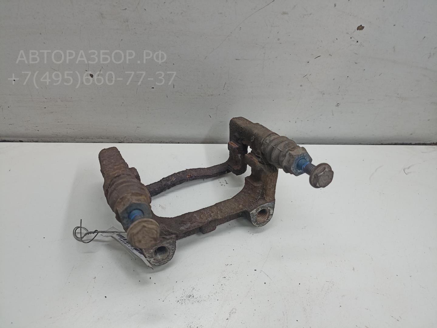 Скоба суппорта заднего