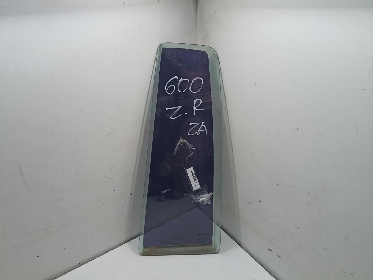 Стекло двери задней левой (форточка)