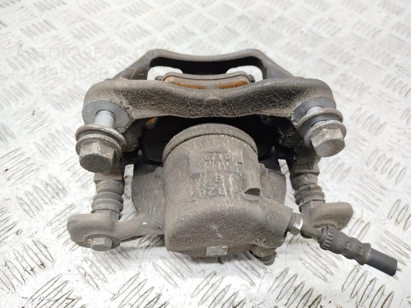 Суппорт передний левый