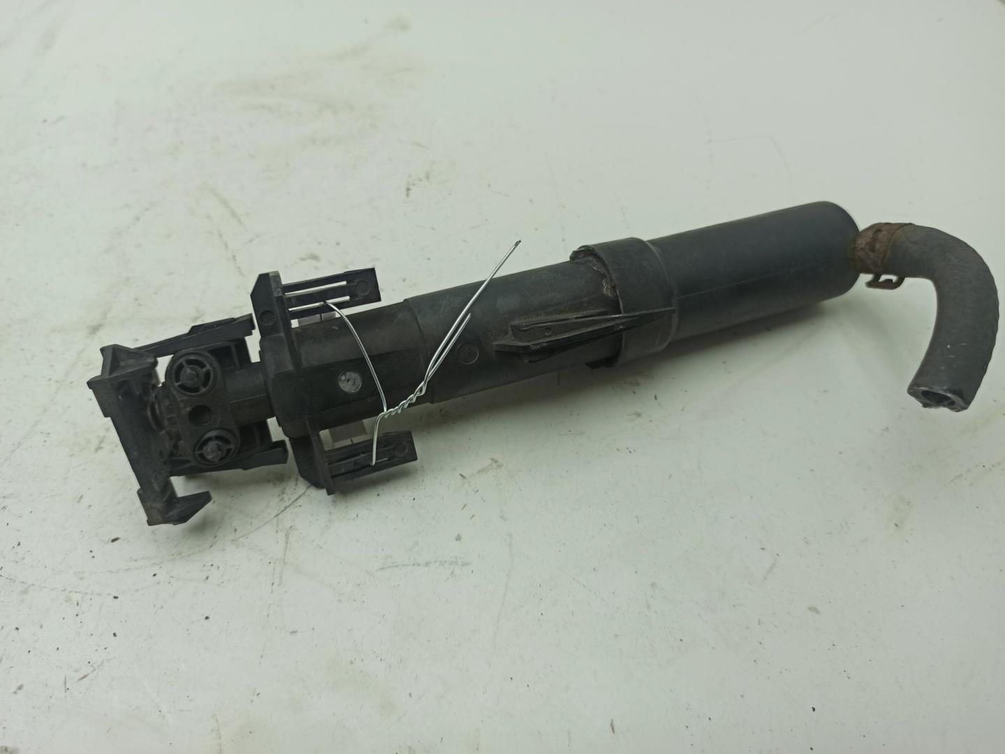 Форсунка омывателя фары