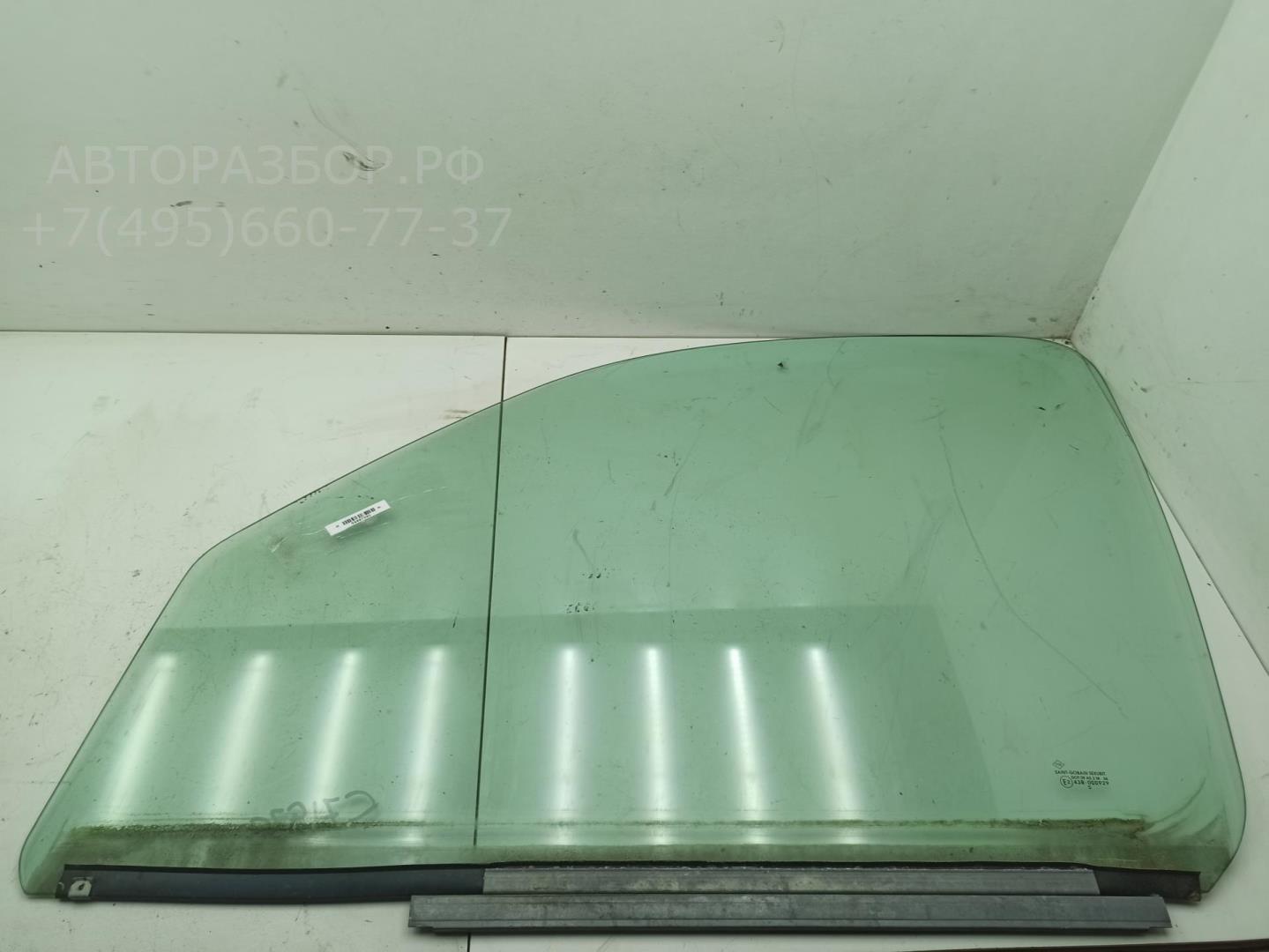Стекло двери передней левой