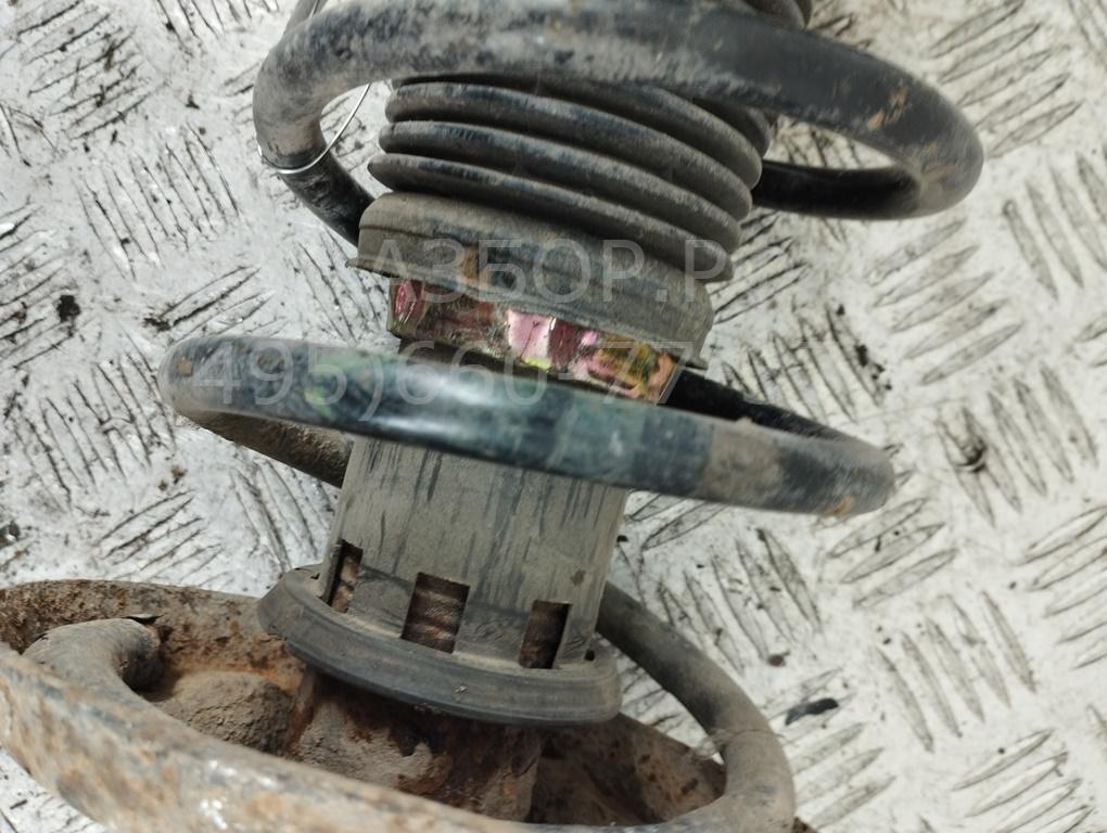 Амортизатор передний левый